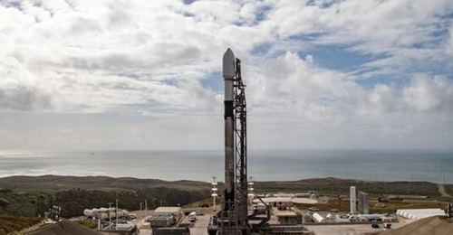 A SpaceX Falcon 9 loaded with a Tranche 0 payload variant for the Space Development Agency's Proliferated Warfighter Space Architecture (PWSA) sits on the launch pad at Vandenberg Space Force Base in California.