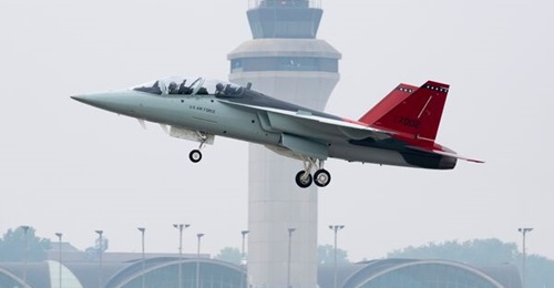 A T-7A is shown during an engineering and manufacturing development first flight at St Louis Lambert International Airport.