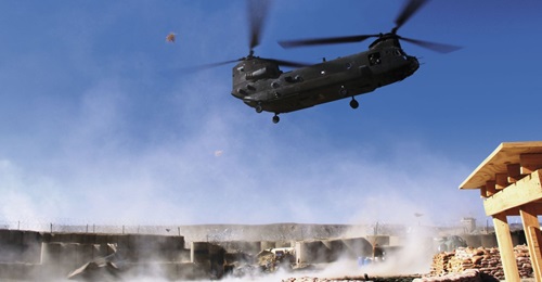 A US Army Chinook helicopter landing at an outpost in eastern Afghanistan. The service plans to award the first LRIP contract for the Block 2 upgrade soon.