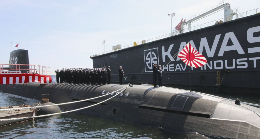 
        JS
        Shoryu,
        the JMSDF's 10th Soryu-class submarine,
        
        pictured at its
        
        commissioning ceremony on
        
        18 March. The last two boats of the class will have lithium-ion batteries instead of lead-acid ones.
       (KHI)