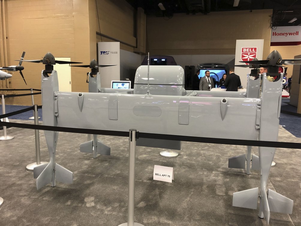 Bell's APT family of aircraft features a bi-wing design that flies nearly horizontally. The APT 70, shown here at the 2019 AAAA Summit, can carry 70 lb of payload. (IHS Markit/Pat Host)