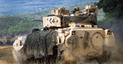US Army Sergeant Ansel Frayer, sitting in the gunner's turret, and his crew manoeuvre their M2A3 Bradley during a live-fire exercise in Bulgaria in August 2018. The service has plans to buy 154 IF-LD APSs for its Bradley fleet.