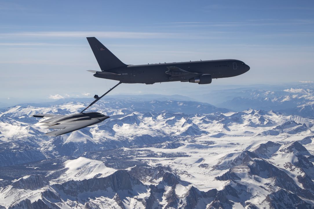 The B-2 (left) refuels with the KC-46A tanker during Phase 2 testing on 23 April 2019. (USAF)