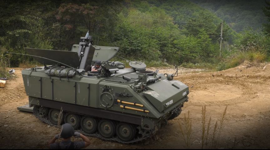 A screengrab taken from a DAPA video showing South Korea's recently developed 120 mm mortar system integrated into an M113-type tracked APC. (DAPA)