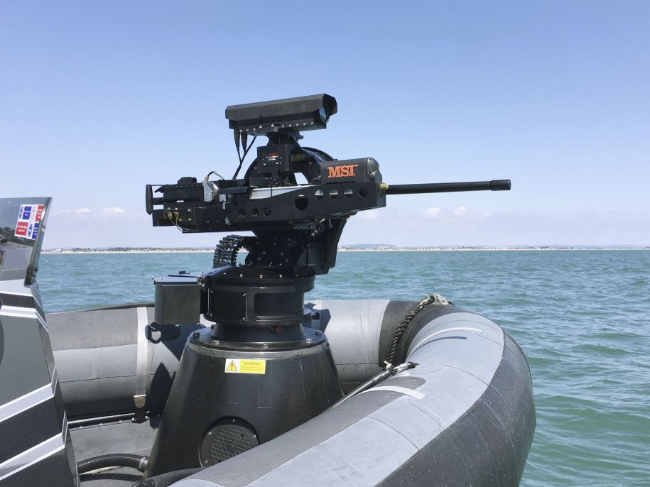 The Seahawk MWS is fitted with an M2HB 0.50 cal heavy machine gun and an on-mount sensor package incorporating a 3–5 µm thermal imager, a low-light TV camera, and a laser rangefinder. (Richard Scott/NAVYPIX)