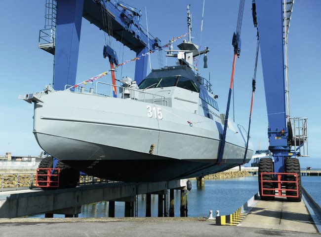 A Saudi HSI32 fast patrol boat is seen in a shiplift at Cherbourg. (Saudi Ministry of Defence)