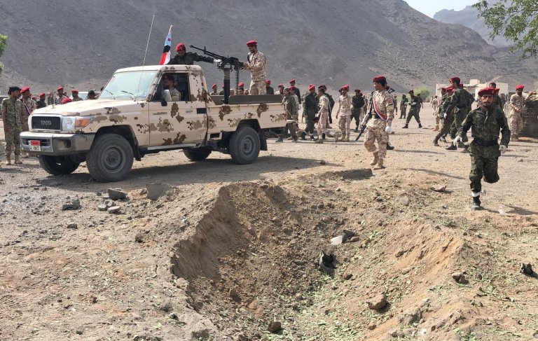 A crater that was more likely caused by a ballistic missile than a Qasef-2K is seen in the aftermath of the 1 August attack on Camp Jalala in the Little Aden area west of Aden port. (Nabil Hasan/AFP/Getty Images)