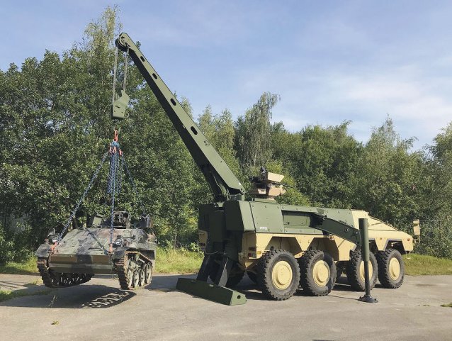 The FFG Boxer Armoured Recovery Module lifting a Wiesel light armoured vehicle. (FFG)