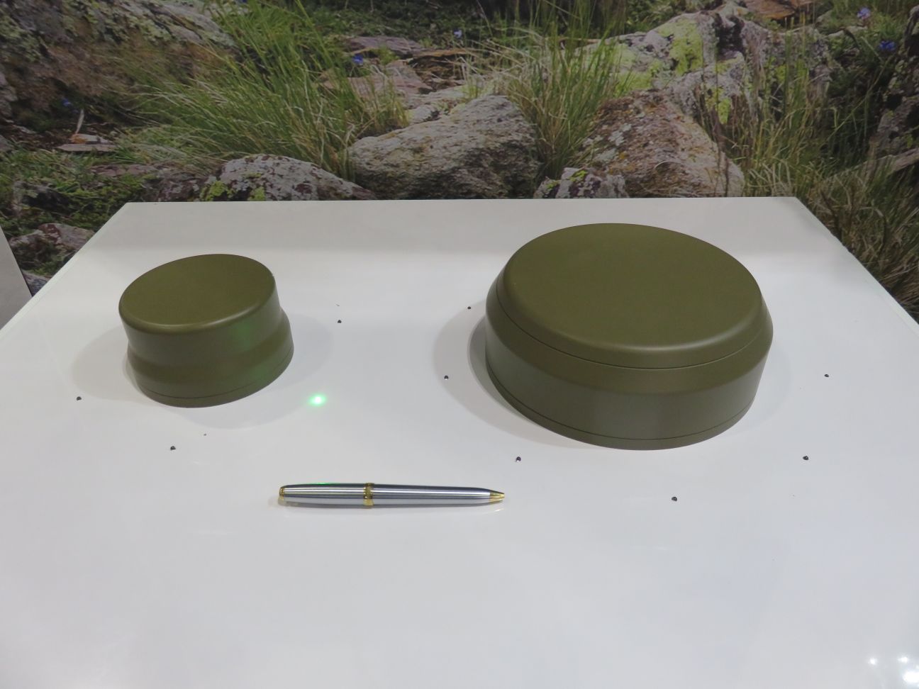 Raytheon UK’s Landshield (left) and Landshield Plus (right) GPS defensive antennas displayed at DSEI 2019. (Giles Ebbutt)