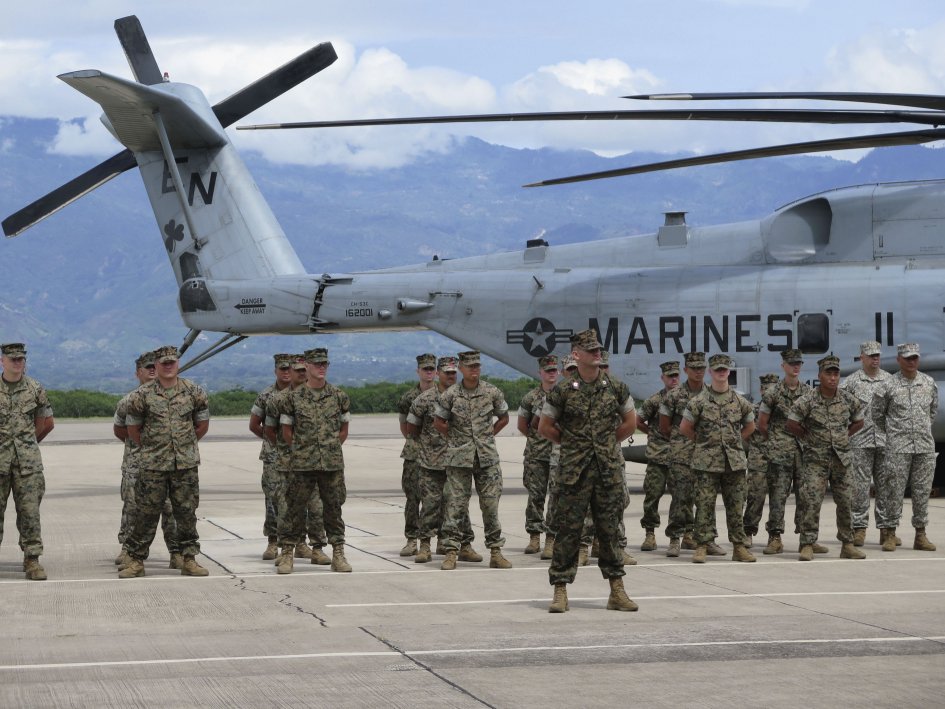 US Marines participate in the 21 June SPMAGTF-SC opening ceremony at Soto Cano Air Base outside of Comayagua, Honduras. Members of the task force are now in Colombia for a week of humanitarian assistance training. (Jane’s/Ashley Roque)