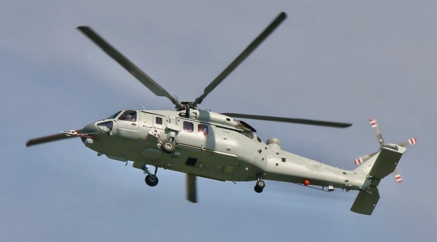 Images have emerged on Chinese online forums showing a naval variant of China’s Z-20 helicopter in flight. (Via lt.cjdby.net/)