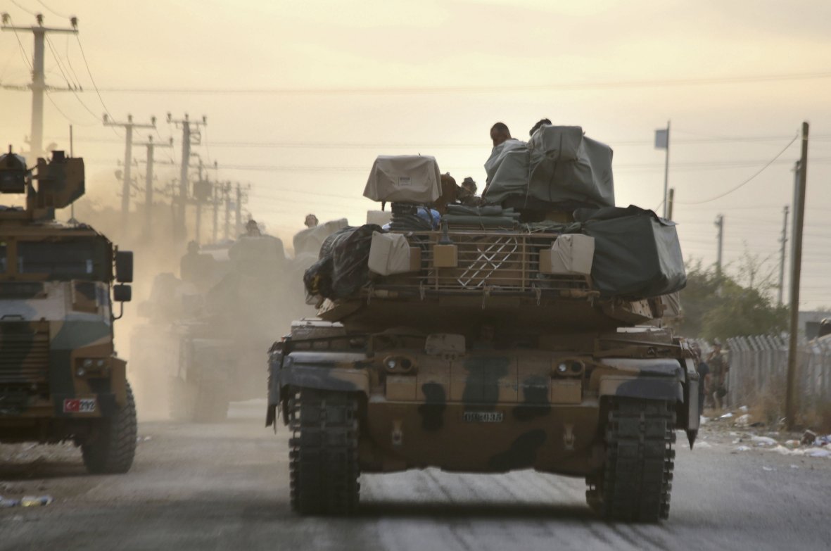 An M60TM with its turret rotated to the rear to show the TEPES mast-mounted electro-optical system (left), a remote weapon station that is probably the Aselsan SARP (right), and laser warning receivers (mounted on its bustle rack) on 11 October. (Bakr Alkasem/AFP via Getty Images)