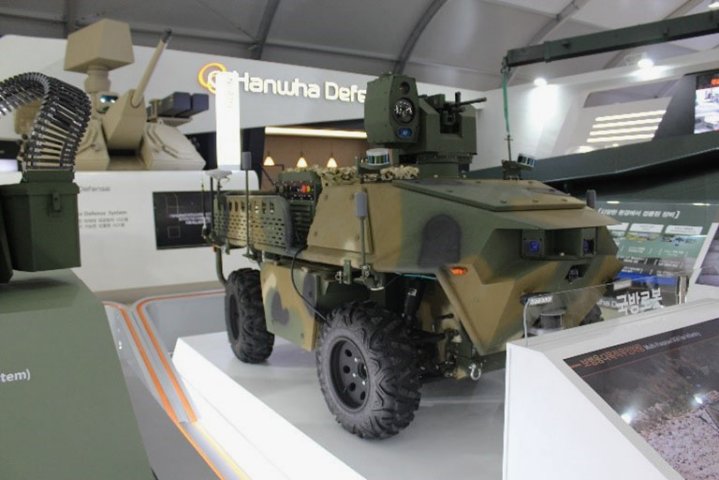 Hanwha Defense displayed a multipurpose 4x4 UGV equipped with a K3 5.56 machine gun and an EO/IR sensor unit at the ADEX 2019 exhibition. (IHS Markit/Sunil Nair)