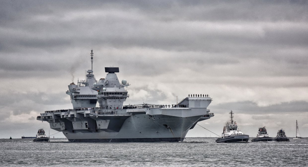 
        HMS
        Prince of Wales
        sailing into Portsmouth harbour on 16 November.
       (Richard Scott/NAVYPIX)