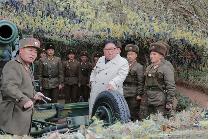 North Korean leader Kim Jong-un (centre) talking with soldiers during a visit to a military unit on Changrin Islet near the western sea border with South Korea. (KCNA)