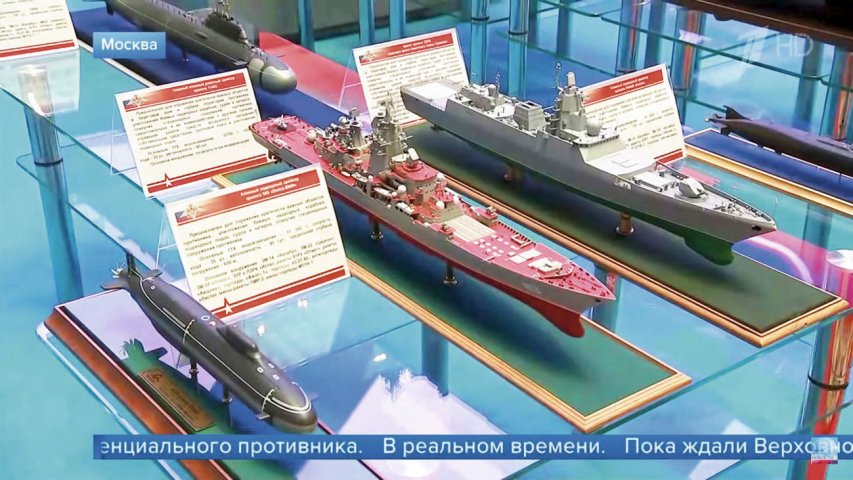 A still taken from a news report on Russia’s Channel One television station aired on 24 December 2019 shows the Project 585 submarine (left) and upgraded Project 11442M cruiser (centre). (Channel One)