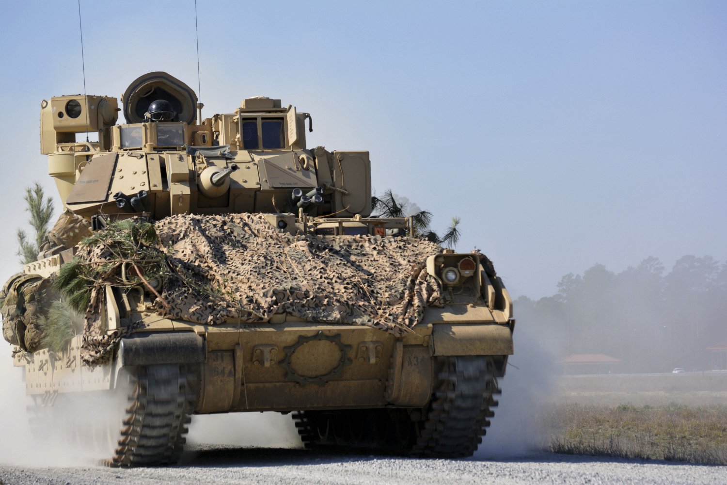 A M2A3 Bradley Fighting Vehicle from 1st Battalion, 64th Armor Regiment manoeuvres during a company combined arms live-fire exercise at Fort Stewart, Georgia, in February 2017. The US Army has now cancelled its Bradley replacement plans under an OMFV prototyping effort. (US Army)