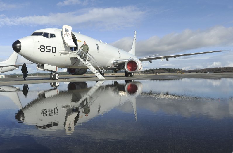 A P-8A is pictured undergoing maintenance at Naval Air Station Whidbey Island prior to an operational deployment.  (US Navy)