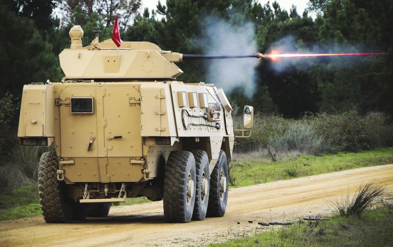 A French Arquus VAB Mk 3 fitted with the PWS Gen 2 engages a target while moving. (John Cockerill Defense)