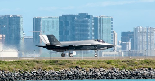 A F-35A, assigned to Luke Air Force Base, Arizona, taxis down the Honolulu Airport runway on 29 January 2019. Newer model F-35As have developed cracking in the outer mold-line coatings and the underlying chine longeron skin after gun use.