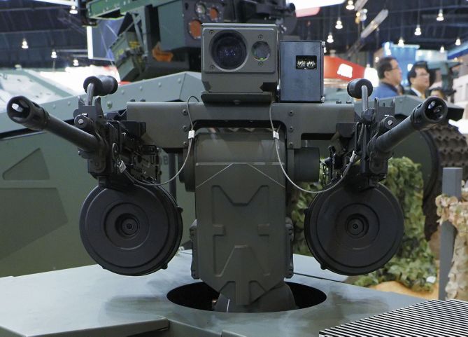 Close up of the Adder Micro remote weapon station, showing its twin weapons mount and independent optical sensors.  (Janes/Kelvin Wong)