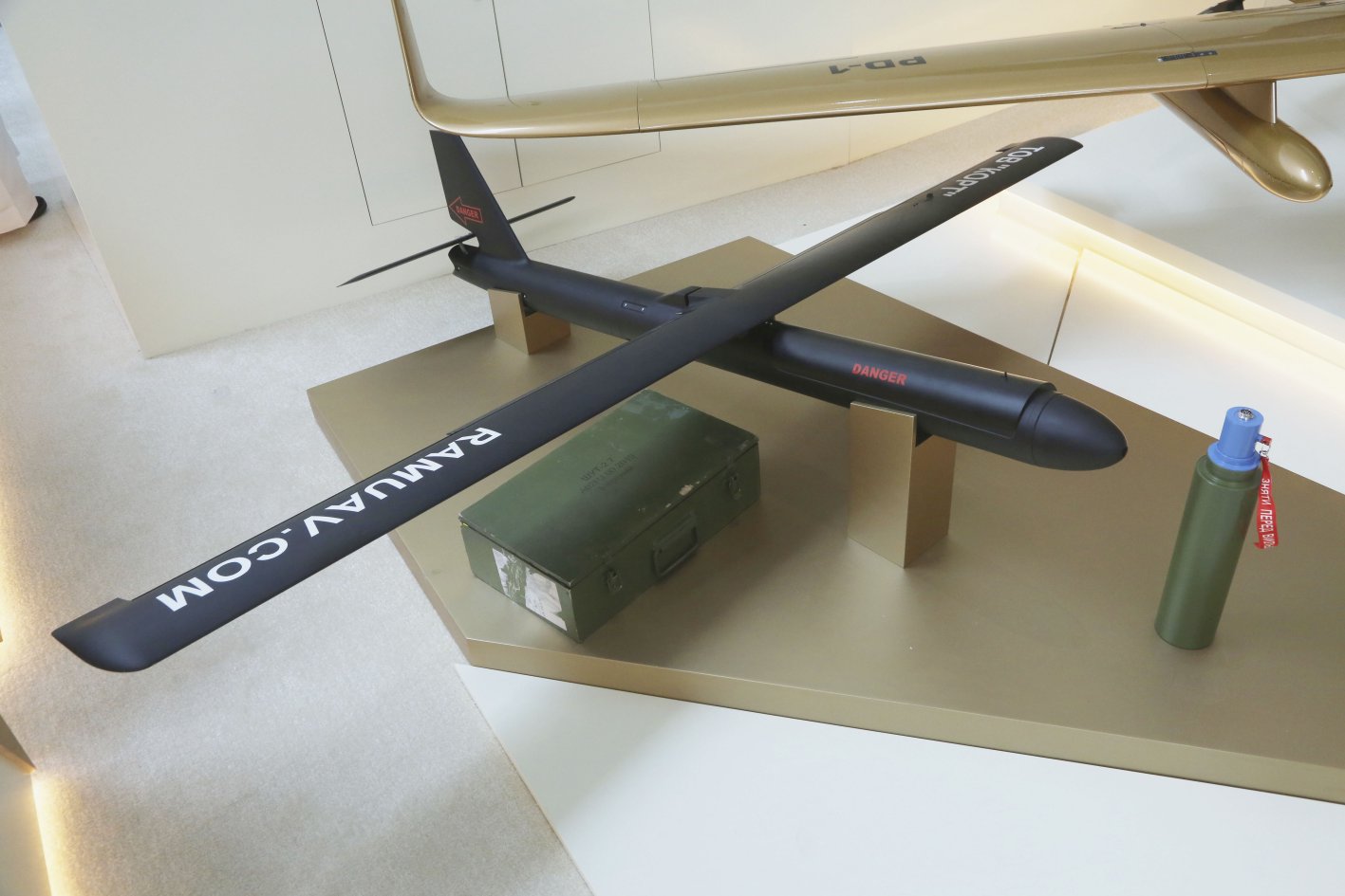 The CDET-developed RAM loitering munition with a modular (interchangeable) warhead (right). (N Novichkov)