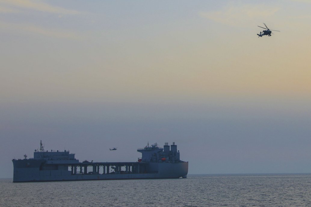 
        A US Army Apache attack helicopter operating from the Expeditionary Landing Base ship USS
        Lewis B. Puller
        (ESB 3) on 27 March.
       (DVIDS)