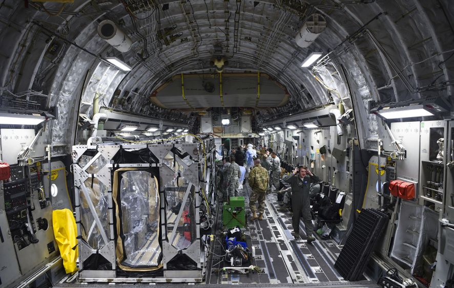 A US Air Force C-17 is prepped to transport a Transportation Isolation System (TIS) on 6 March 2019. The USAF on 10 April 2020 conducted the first operational use of the TIS to perform an aeromedical evacuation of three federal government contractors who tested positive for the novel coronavirus (Covid-19). (US Air Force)