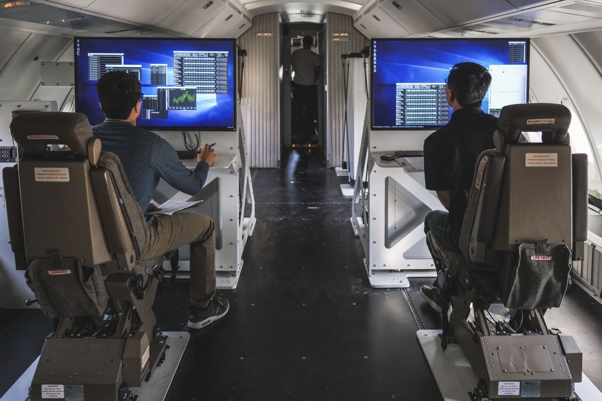 Launch engineers monitor data screens on Cosmic Girl’s flight deck (Virgin Orbit)