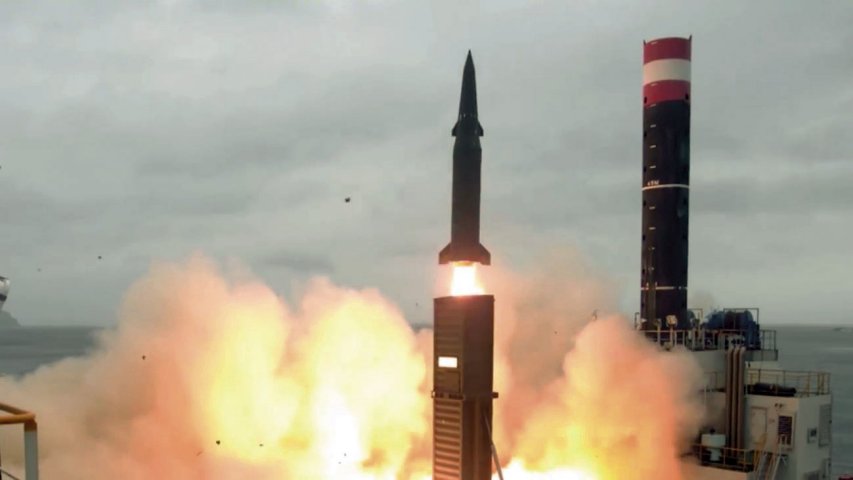 An 800 km-range Hyunmoo-2C ballistic missile being fired from a truck-mounted launcher.