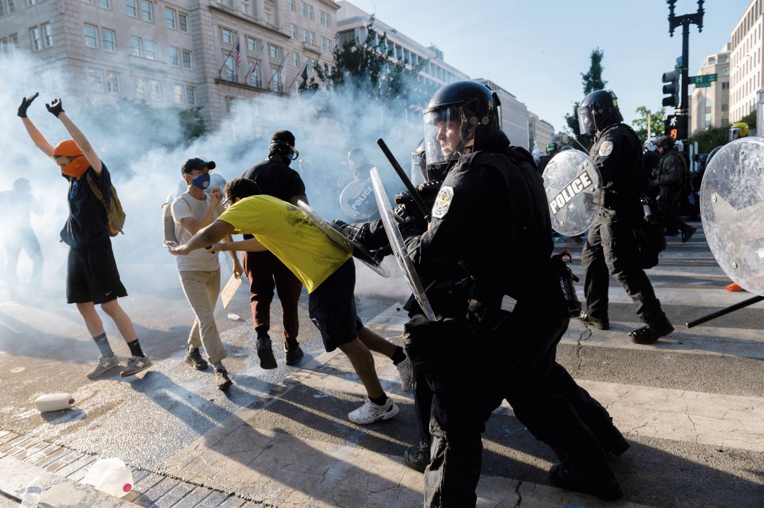 United States Park Police push back protesters near the White House in Washington, DC, on 1 June 2020. External influences on the protests appeared to be opportunistic rather than centrally directed, according to the US Department of Homeland Security. 