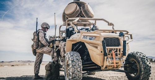 1st Lieutenant Taylor Barefoot programs a C-UAS on a Light Marine Air Defense Integrated System (LMADIS) during a predeployment training exercise at Marine Corps Air Ground Combat Center Twentynine Palms, California in 2018. The service is now moving f...