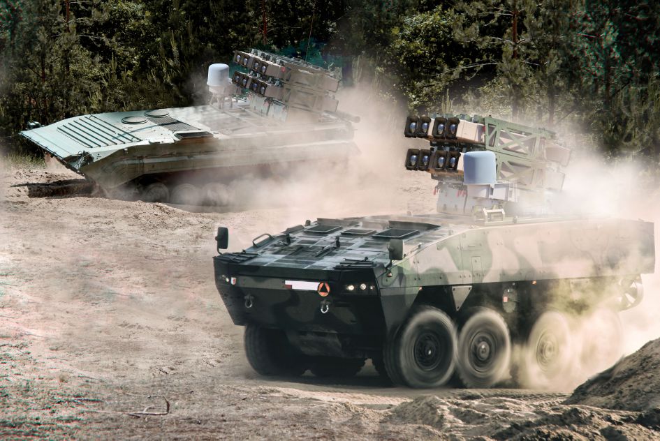 Rafael’s Spike NLOS can be integrated into both wheeled and tracked platforms, including Poland’s Rosomak 8×8 armoured personnel carrier (foreground) and BWP-1 infantry fighting vehicle (background).  (Rafael Advanced Defense Systems )