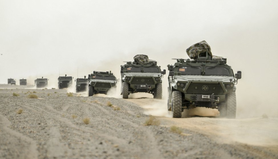 Chinese military vehicles attached to an artillery brigade under the PLA’s 74th Group Army photographed at an undisclosed location on 7 June. Among the vehicles are Dongfeng Mengshi CSK181 4×4 armoured vehicles (front) and several units of the new 155 mm SPH by Norinco (background). (Via China Military Online)