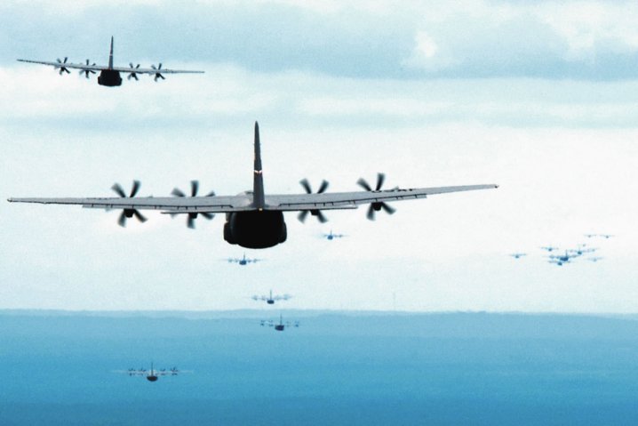 A formation of US Air Force C-130Js fly towards a drop zone during an exercise. Lockheed Martin has been awarded USD15 billion to cover work through to 2030, which follows an earlier 2016 award for USD10 billion to cover production through to 2016.  (US Air Force)