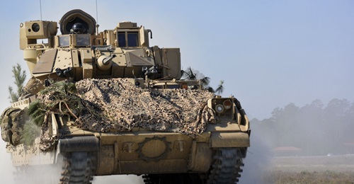 An M2A3 Bradley Fighting Vehicle from 1st Battalion, 64th Armor Regiment, manoeuvres during a company combined-arms live-fire exercise at Fort Stewart, Georgia, in February 2017. The US Army has released a draft RFP for its revamped Bradley replacement...