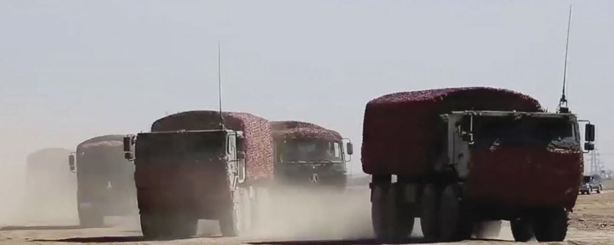 A screengrab from CCTV 7 video footage released on 28 July showing new heavy-duty trucks (the two vehicles in the foreground) that have entered service with the PLA’s Tibet Military District.  (CCTV 7)