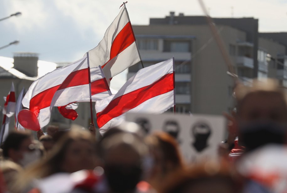 Opposition activists take to the streets in Minsk, Belarus, on 13 September. After the announcement of the 2020 Belarusian presidential election results on 9 August, mass protests against the election results erupted in major cities across Belarus. (Valery Sharifulin/TASS via Getty Images)