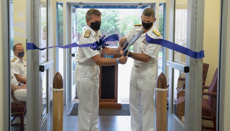 JFC Atlantic commander US Vice Admiral Andrew Lewis (right) and his deputy, UK Royal Navy Rear Admiral Andrew Betton cutting the ribbon during the new command’s IOC ceremony. (US Navy/MC Specialist 1st Class Theodore Green)