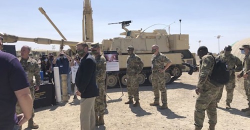 US Army Secretary Ryan McCarthy and Army Chief of Staff Gen James McConville receive a briefing after the Project Convergence 2020 capstone event on 23 September.