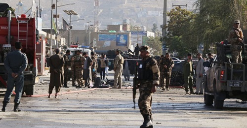 Afghan security forces inspect the scene of a car bomb explosion in Kabul on 27 October that resulted in at least three people being killed and 13 others wounded. The level of violence in Afghanistan remains high, despite ongoing peace talks between th...