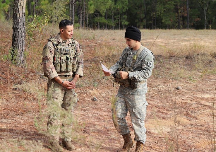 Sergeant First Class Jeremiah Velez, left, an advisor with 3rd Squadron, 1st SFAB, works with a simulated foreign partner during a field training exercise in October 2019 at Fort Benning, Georgia. Soldiers from the 1st SFAB will head to Honduras in January 2021. (US Army)