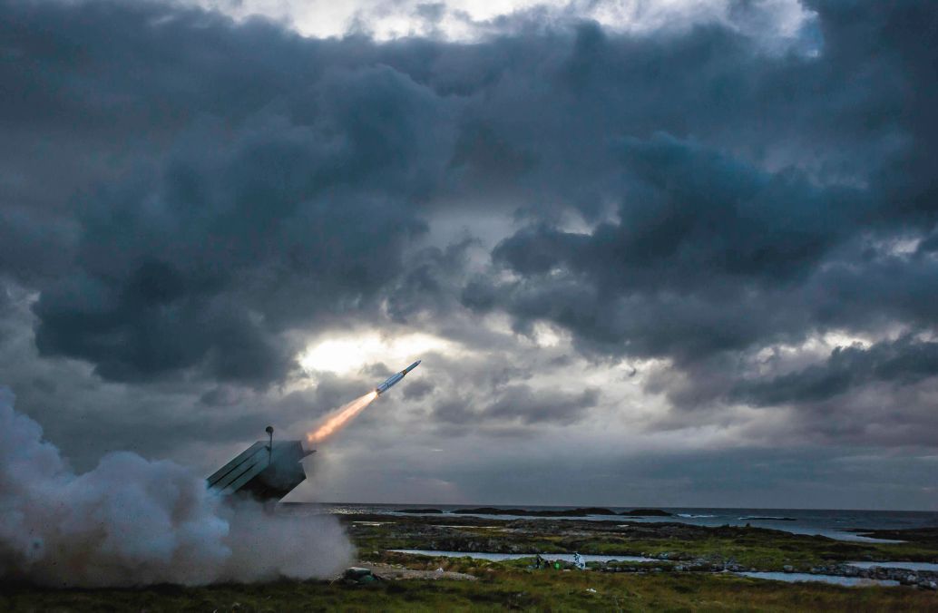 A baseline AMRAAM-ER surface-to-air interceptor is fired from a NASAMS launcher at the Andøya Test Center, Norway, in August 2016. Raytheon described the shot as “more of a ‘concept demonstration’ rather than a flight test” (Raytheon Technologies)