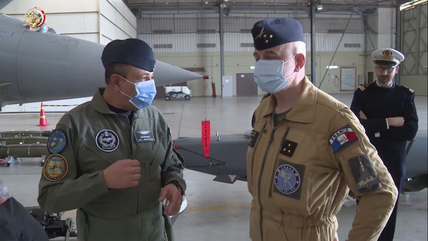 An Egyptian and French officer stand in front of a SCALP cruise missile in a still from the exercise video. (Egyptian Ministry of Defence)