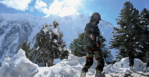 Indian soldiers near the Zojila mountain pass connecting Srinagar to Ladakh, bordering China, in November 2020. The Indian and Chinese armies have agreed to pull back along the northern and southern banks of the 4,350 m-high Pangong Tso (Pangong Lake) ...