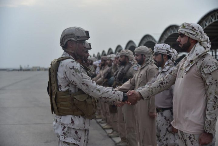 The UAE has never admitted it has a base in Eritrea, although its official news agency released this photograph in August 2019 showing personnel at the facility. They are standing in front of the 12 aircraft shelters that have not been dissembled as yet. (WAM)