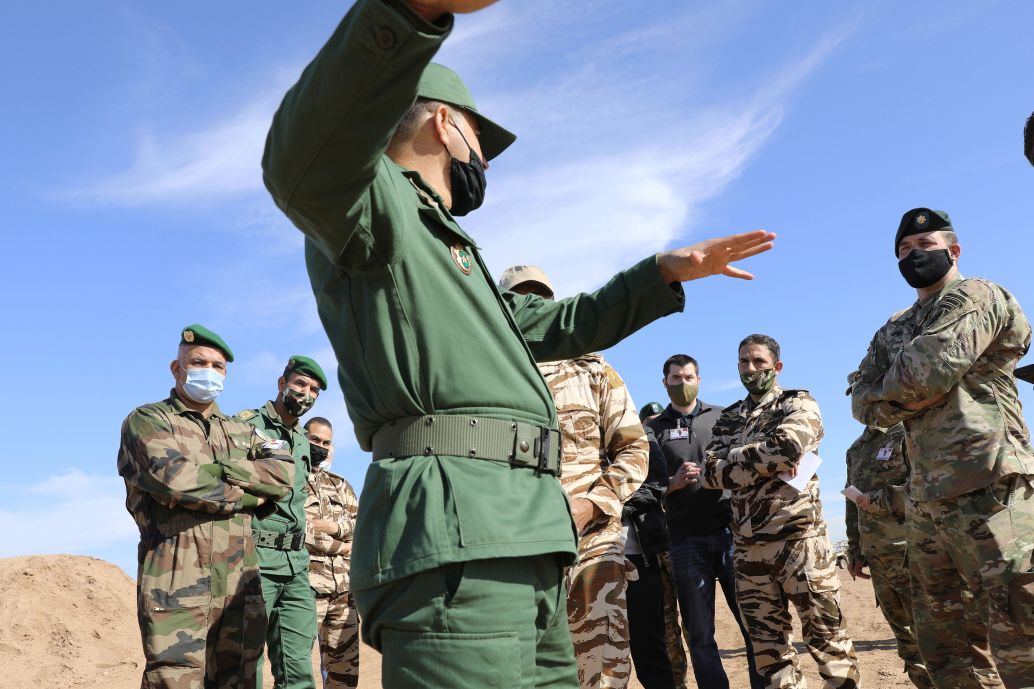 An officer with the Royal Moroccan Armed Forces explains the capabilities of firing at range during a site survey in preparation for African Lion 2021. (US Army )