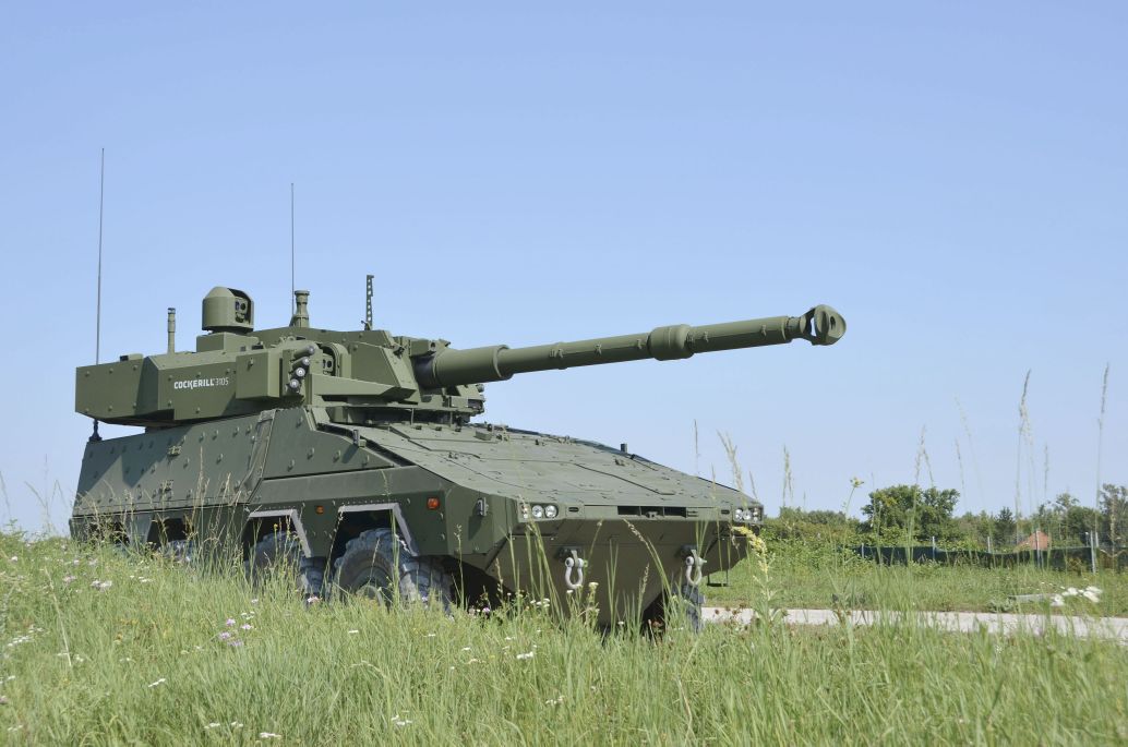 A Boxer MRAV with its rear mission module mounting the John Cockerill Defense C3105, and showing the roof-mounted commander’s panoramic sighting system.  (Krauss-Maffei Wegmann)