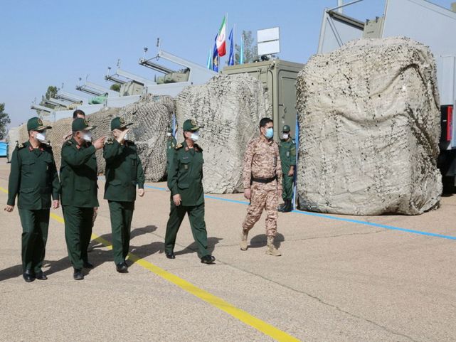 IRGC commander Major General Hossein Salami and IRGN Navy commander Rear Admiral Alireza Tangsiri inspect anti-ship missile launchers. (Islamic Revolution Guards Corps)