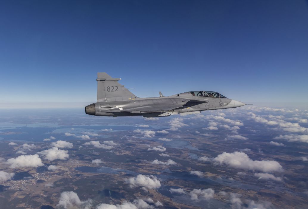 The bright silver panel that was 3D printed can be seen attached to the aft section of the Gripen D testbed during its first flight earlier in March. (Saab)